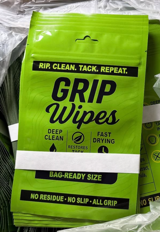 Bright green package of Grip Wipes golf grip cleaning wipes